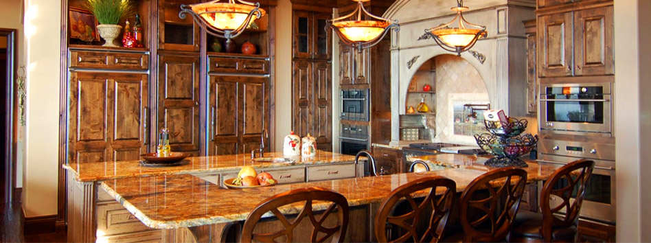Custom rustic kitchen with granite island and hand-crafted cabinetry by Mike McCloud Construction