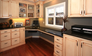 Custom home office with built-in cabinetry
